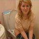 A cute blonde girl grunts and strains on the toilet, then finally produces a nice, soft, noisy shit.